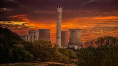 nuclear power plant with red sky