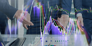 person pointing to a graph representing power trading data